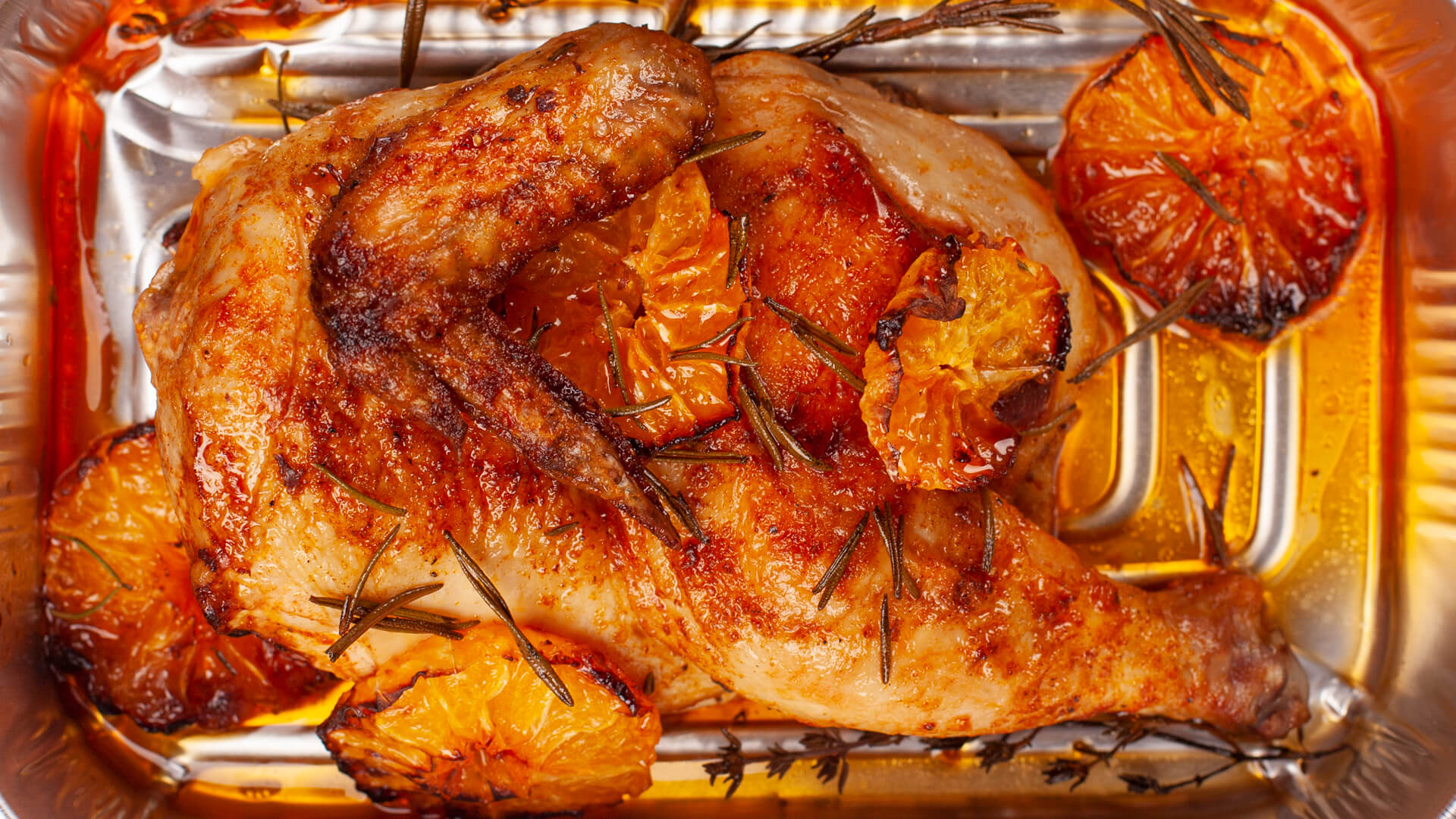 Пів курчати з мандаринами та духмяними травами